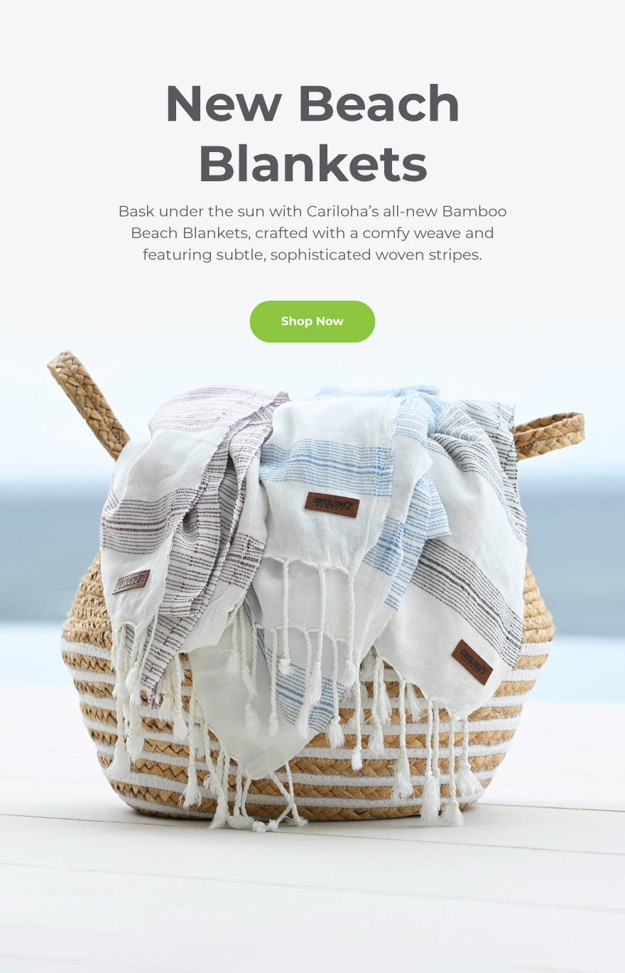 New Beach Blankets, crafted with a comfy weave and subtle, sophisticated woven stripes. Shop Now.