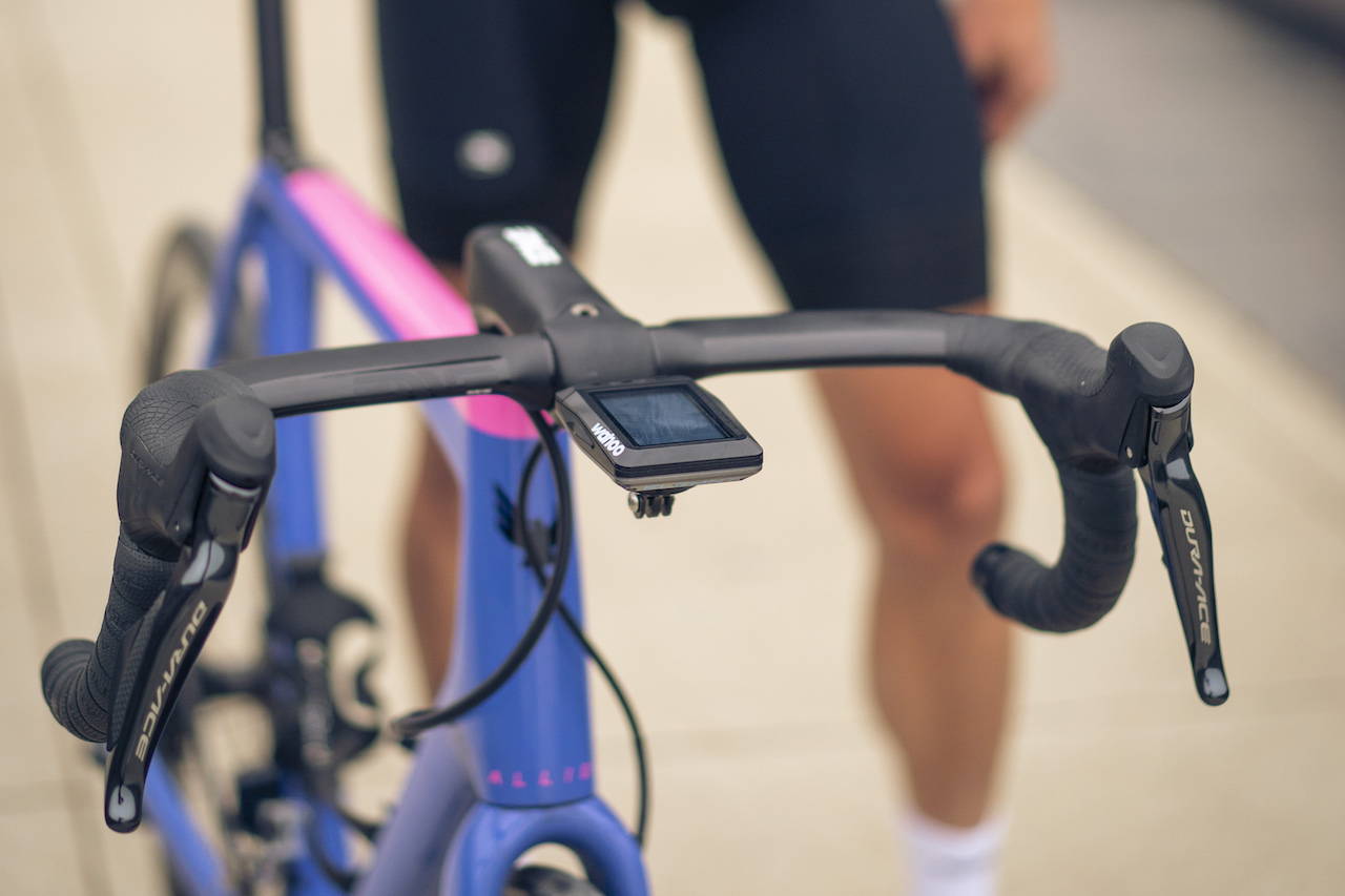 A bike with an altimeter mounted to the handlebars