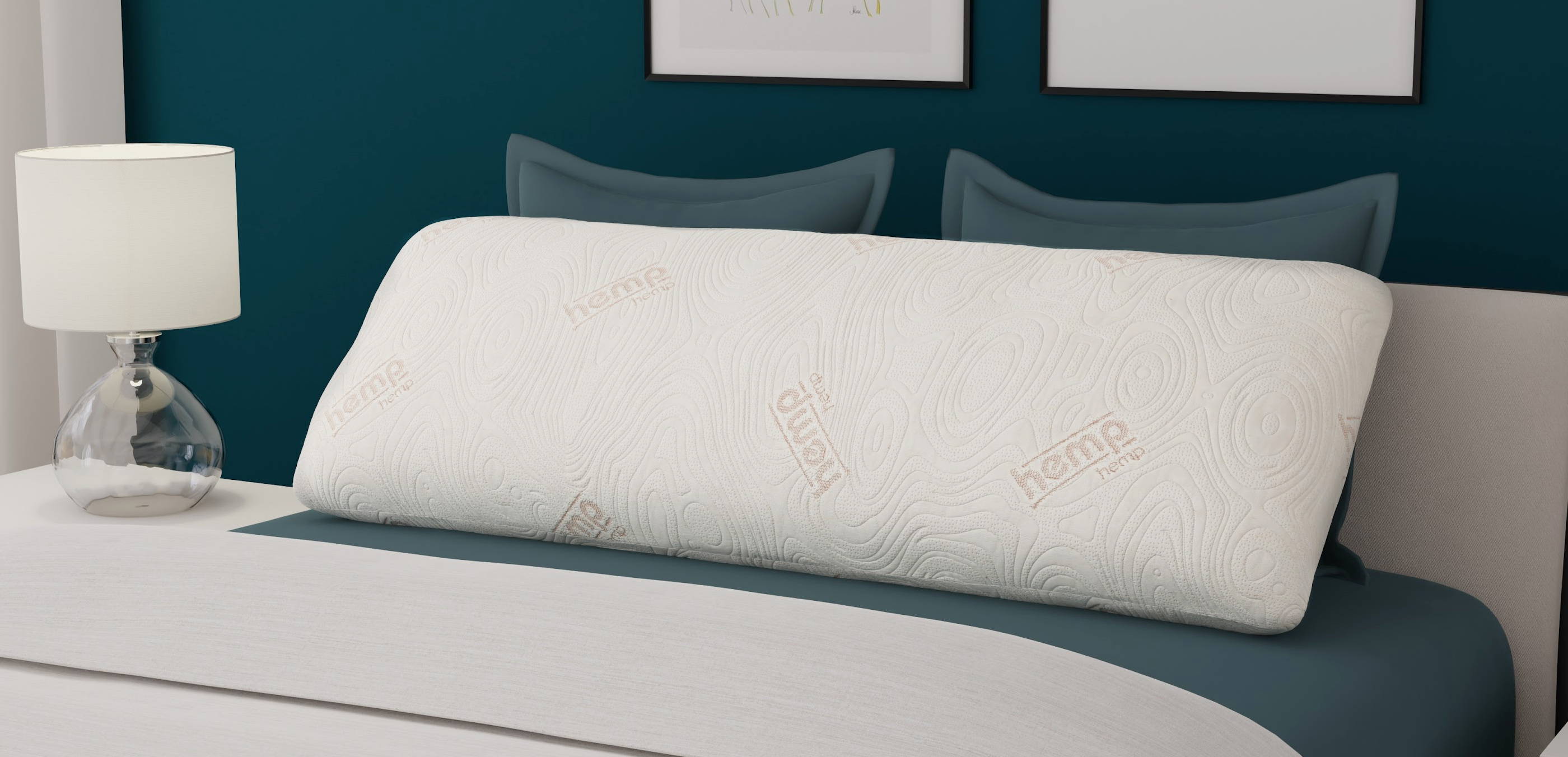 ZenCloud Memory Foam Body pillow with CBD and copper infusion laying down across the bed in a bedroom.