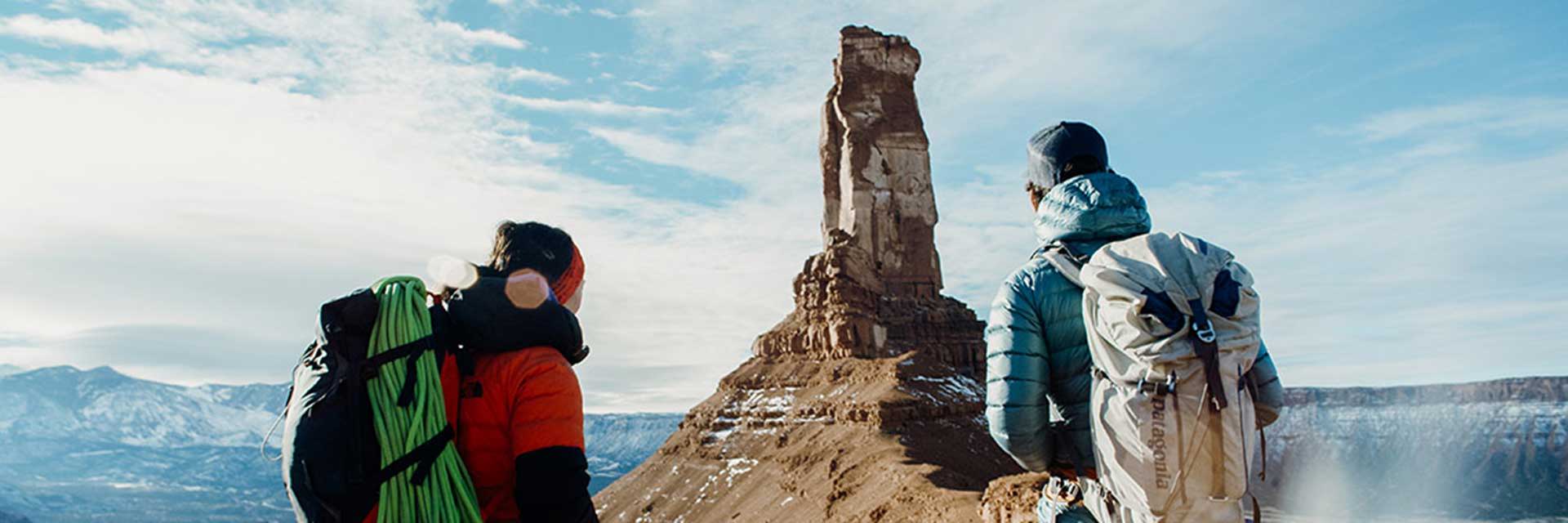 Climbers looking out at rock structure