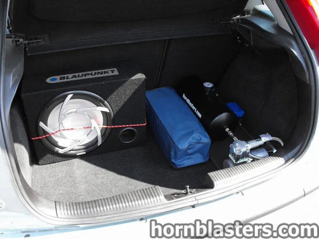 Front angle of 2004 Ford Focus with Shocker XL train horn kit HornBlasters gallery photo 3
