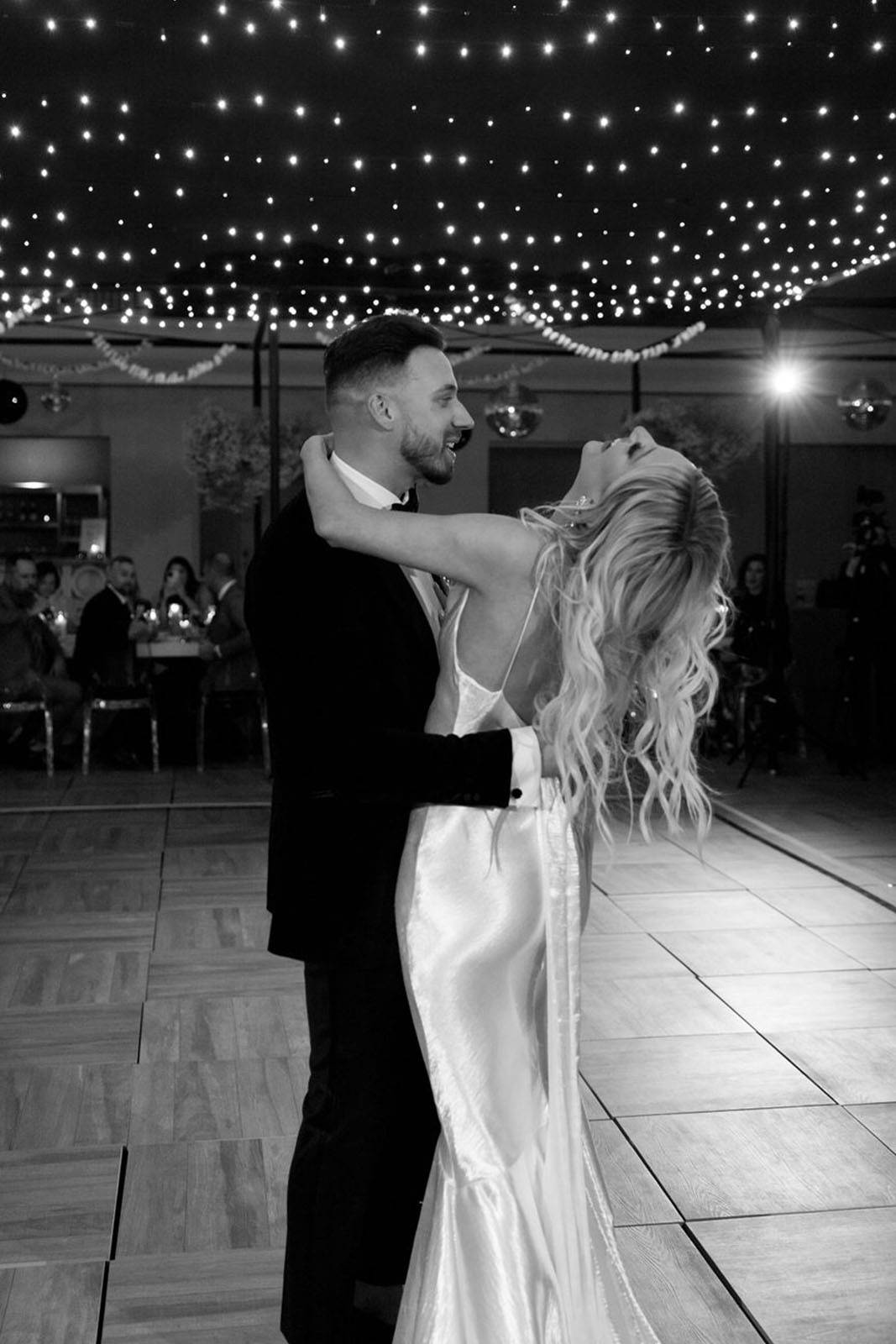 Bride and groom share a playful first dance