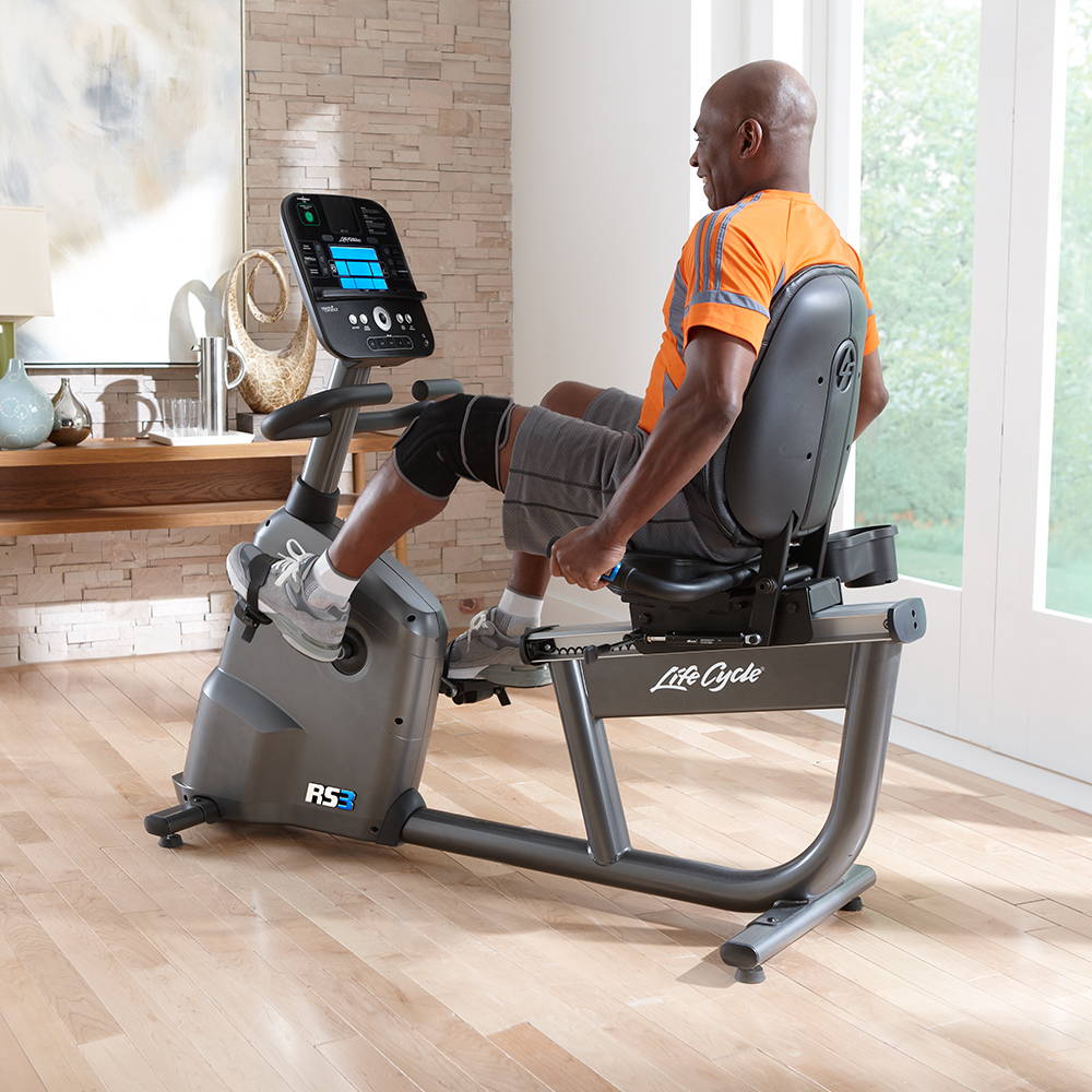 Man exercising on RS3 exercise bike at home