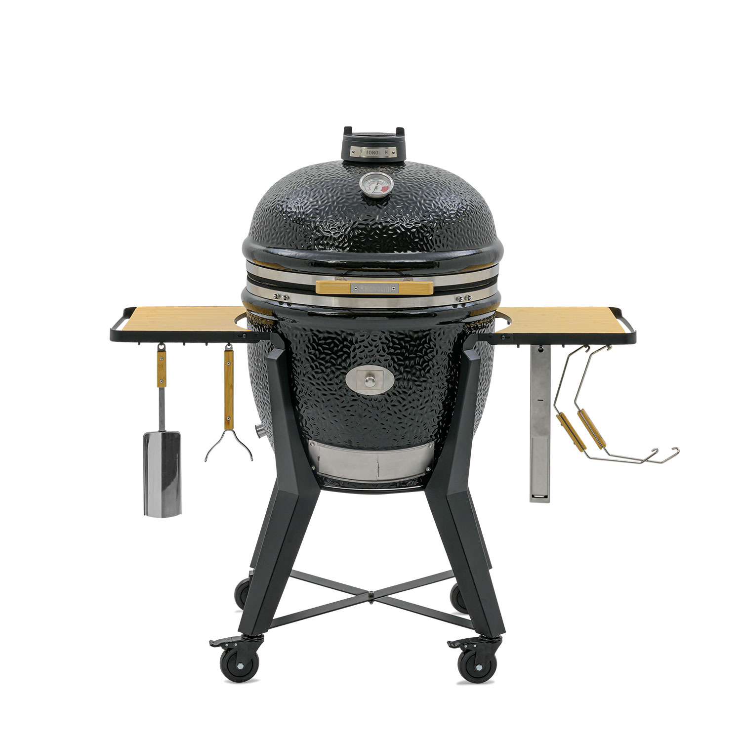 A black ceramic grill on a wheeled cart with wooden side tables.