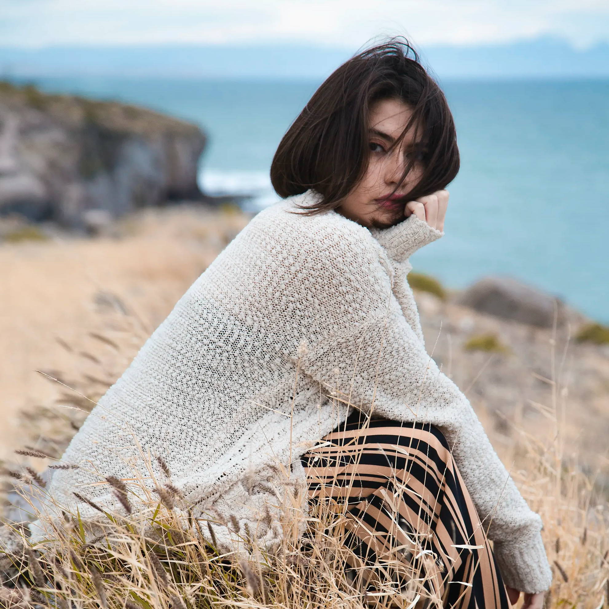 Image of a woman in a sweater