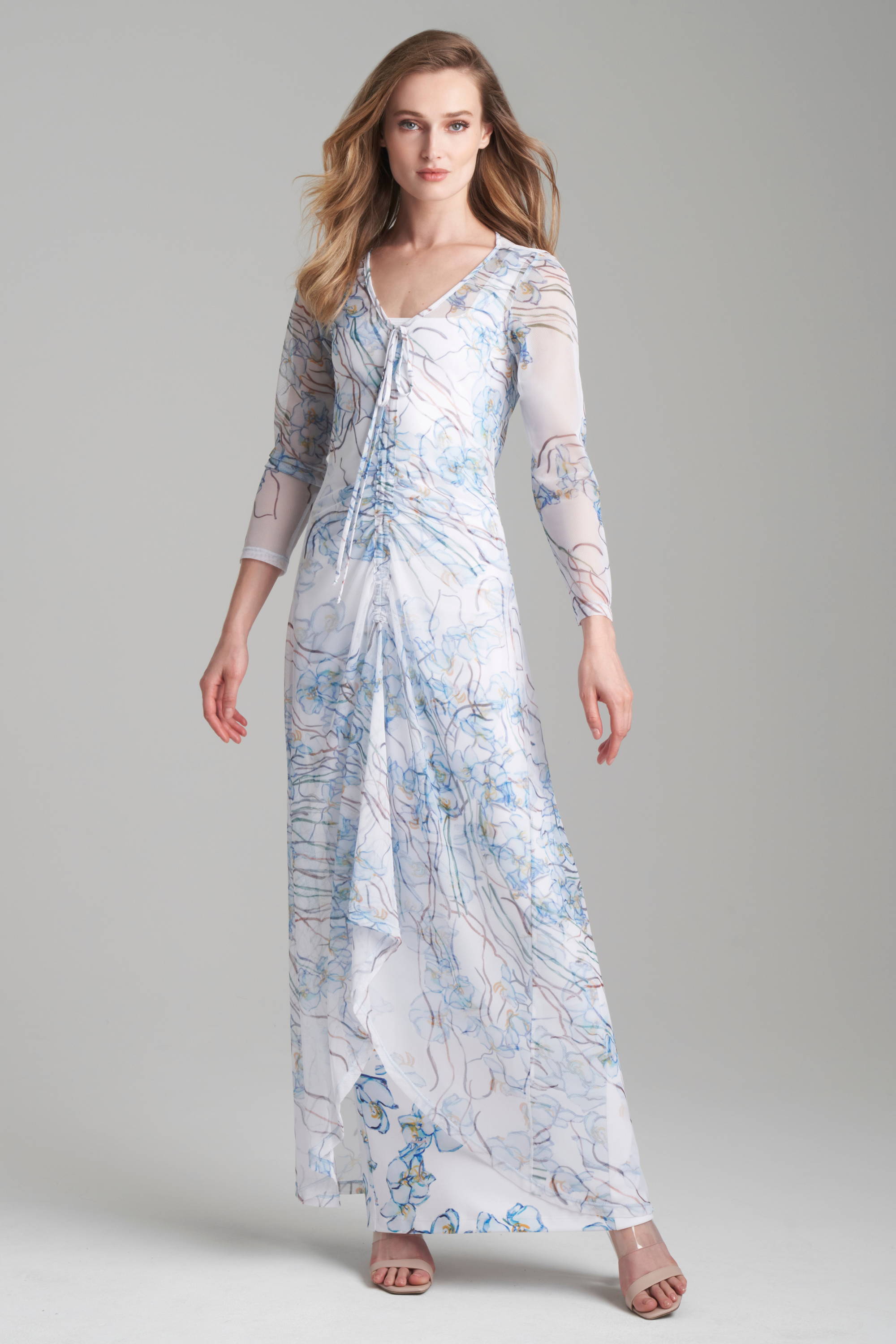 Woman wearing mes dress topper over long stretch knit floral printed dress by Ala von Auersperg for spring 2024