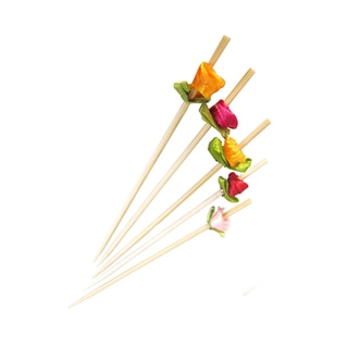 Several bamboo skewers with a small cloth colorful flower design on the ends