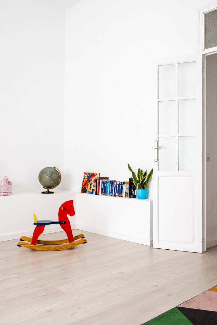 Bright children's room furnished in a minimalistic and friendly way | metal booth