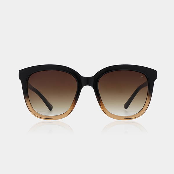 A product image of the A.Kjaerbede Billy sunglasses in Black to Brown transparent.