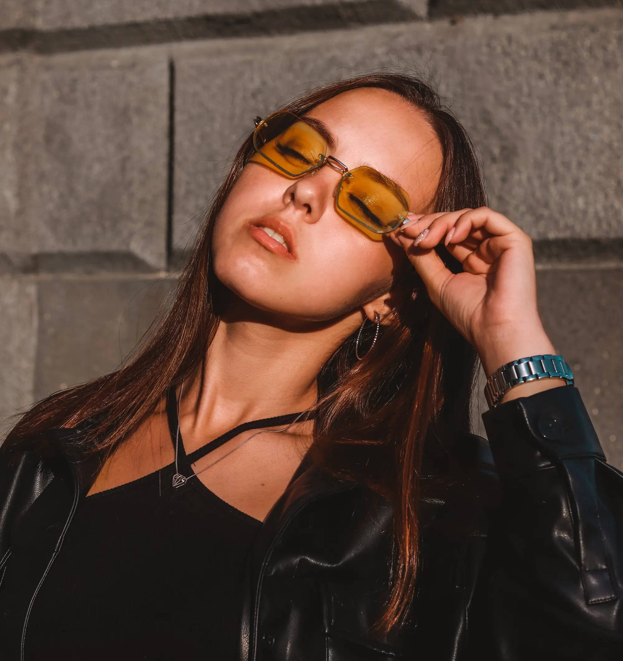 girl wearing yellow tinted glasses for migraines