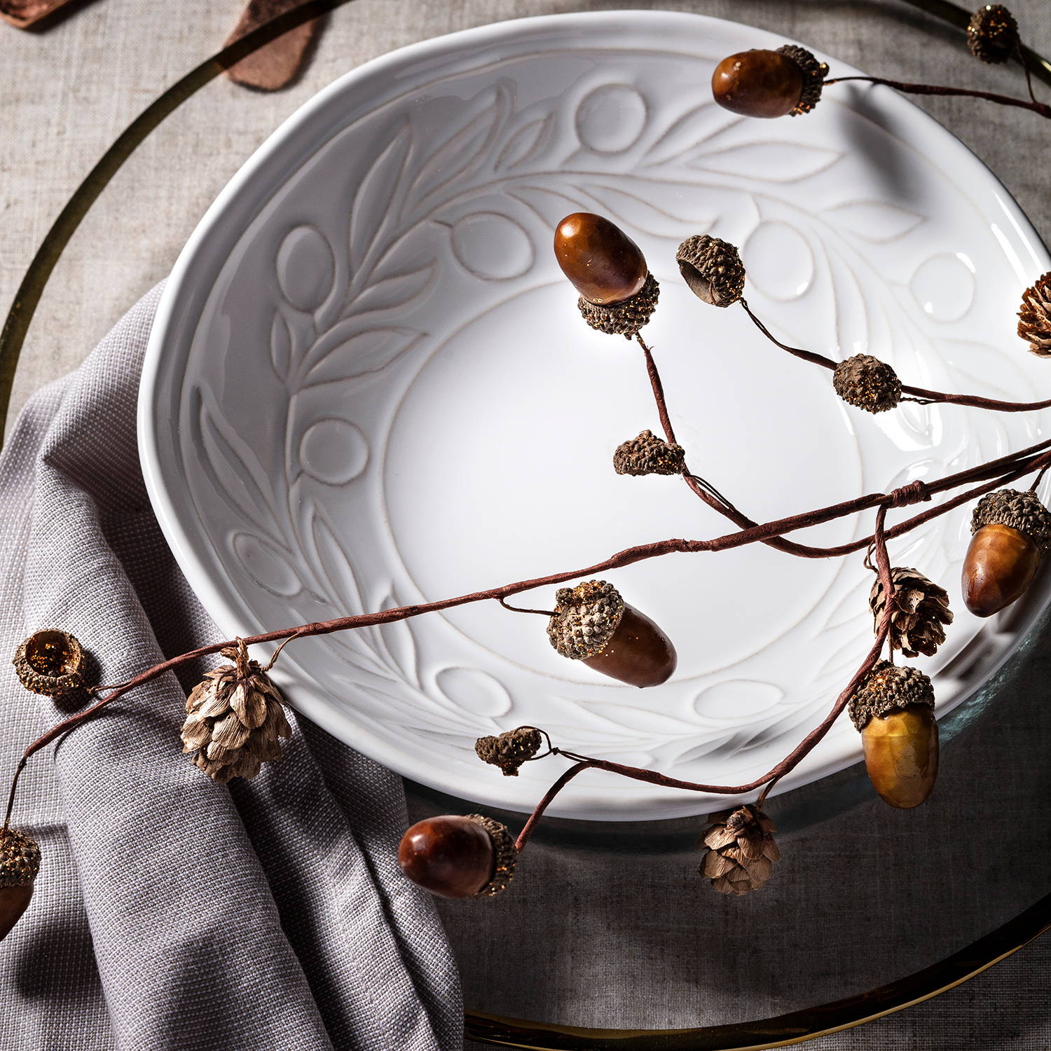 Acorn autumnal garland styled as part of table display