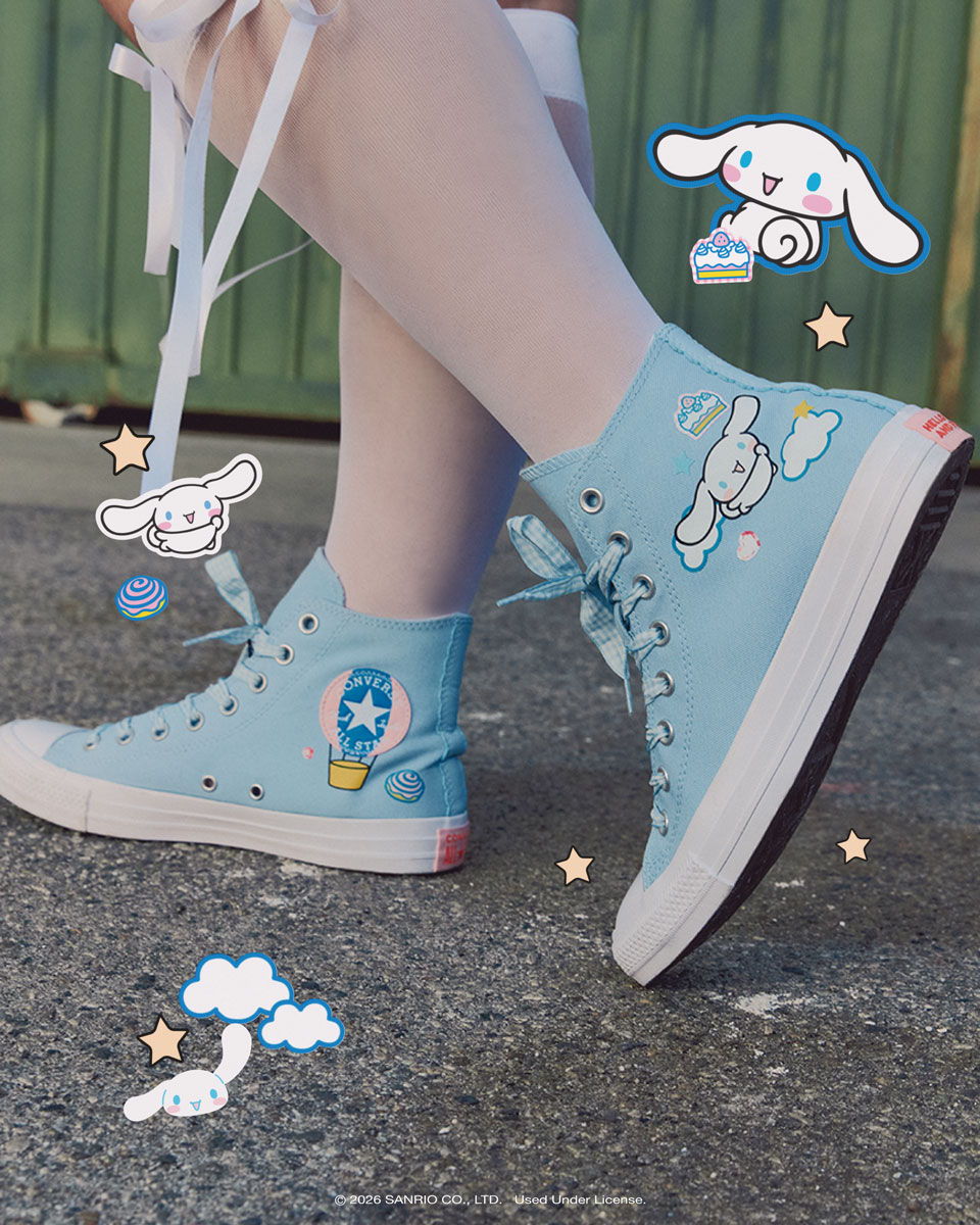 Blue high-top sneakers with cute cartoon designs and playful decorations.