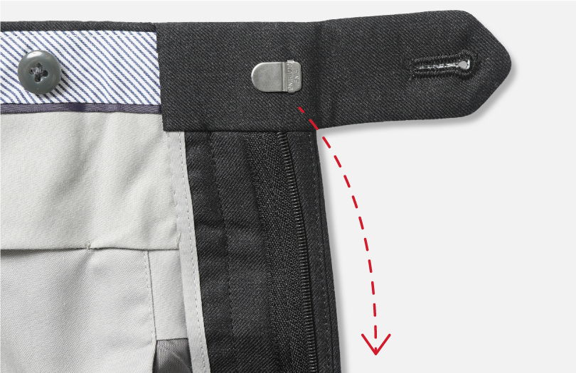 Close-up of a button and fabric detail on a garment.