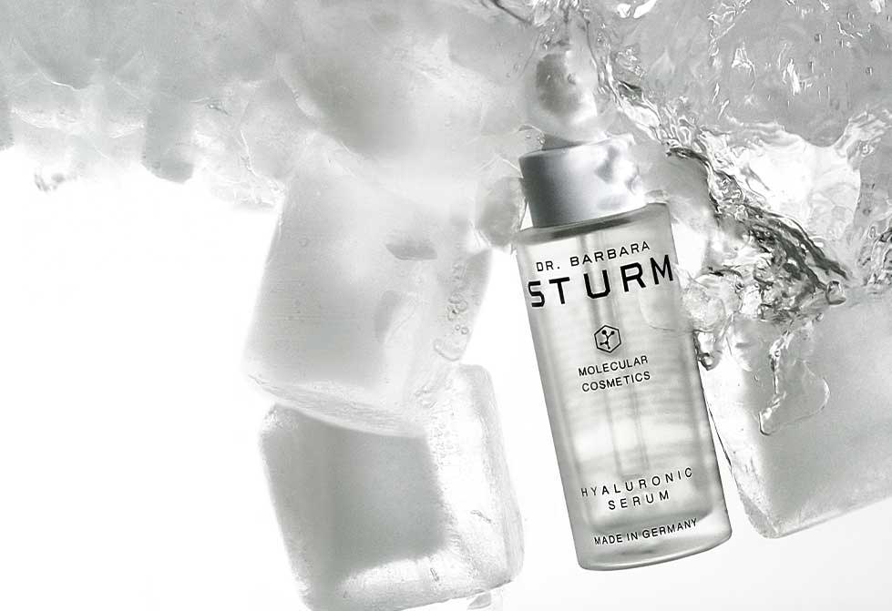 hyaluronic serum surrounded by ice and water