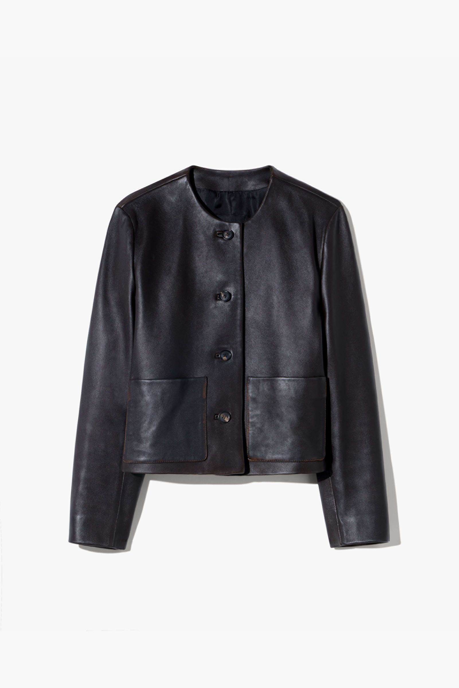 Black leather jacket with a round neckline and button closure.