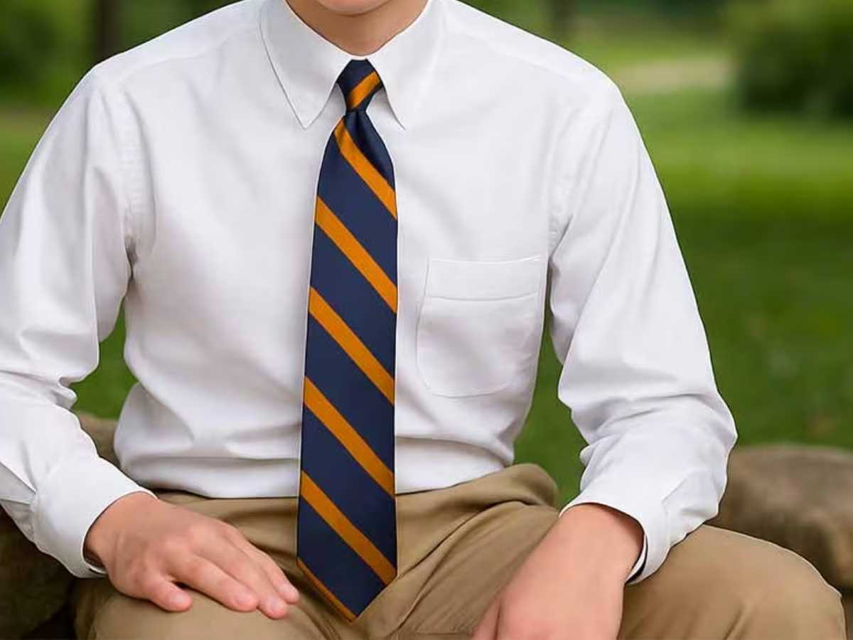 Teen wearing a striped tie for senior pics