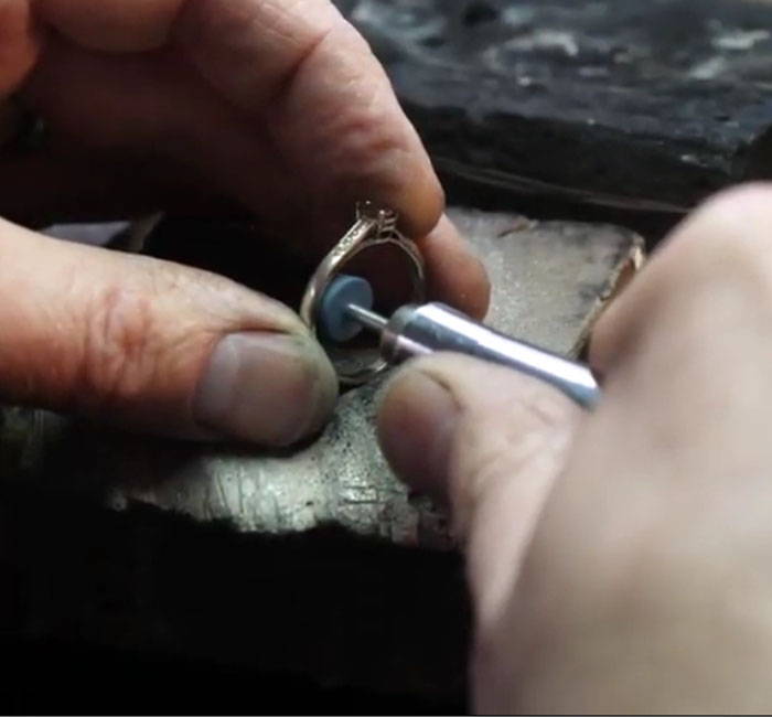 Polishing a ring in our workshop