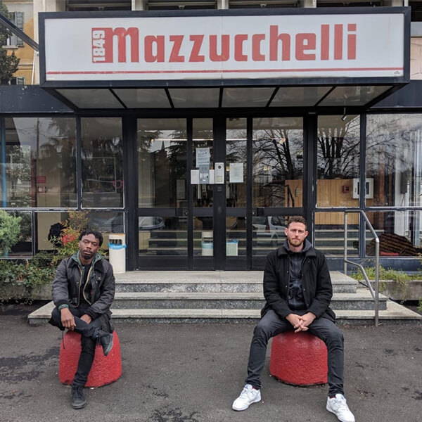 Oscar and Sheriff-Deen outside the Mazzucchelli factory in Italy.