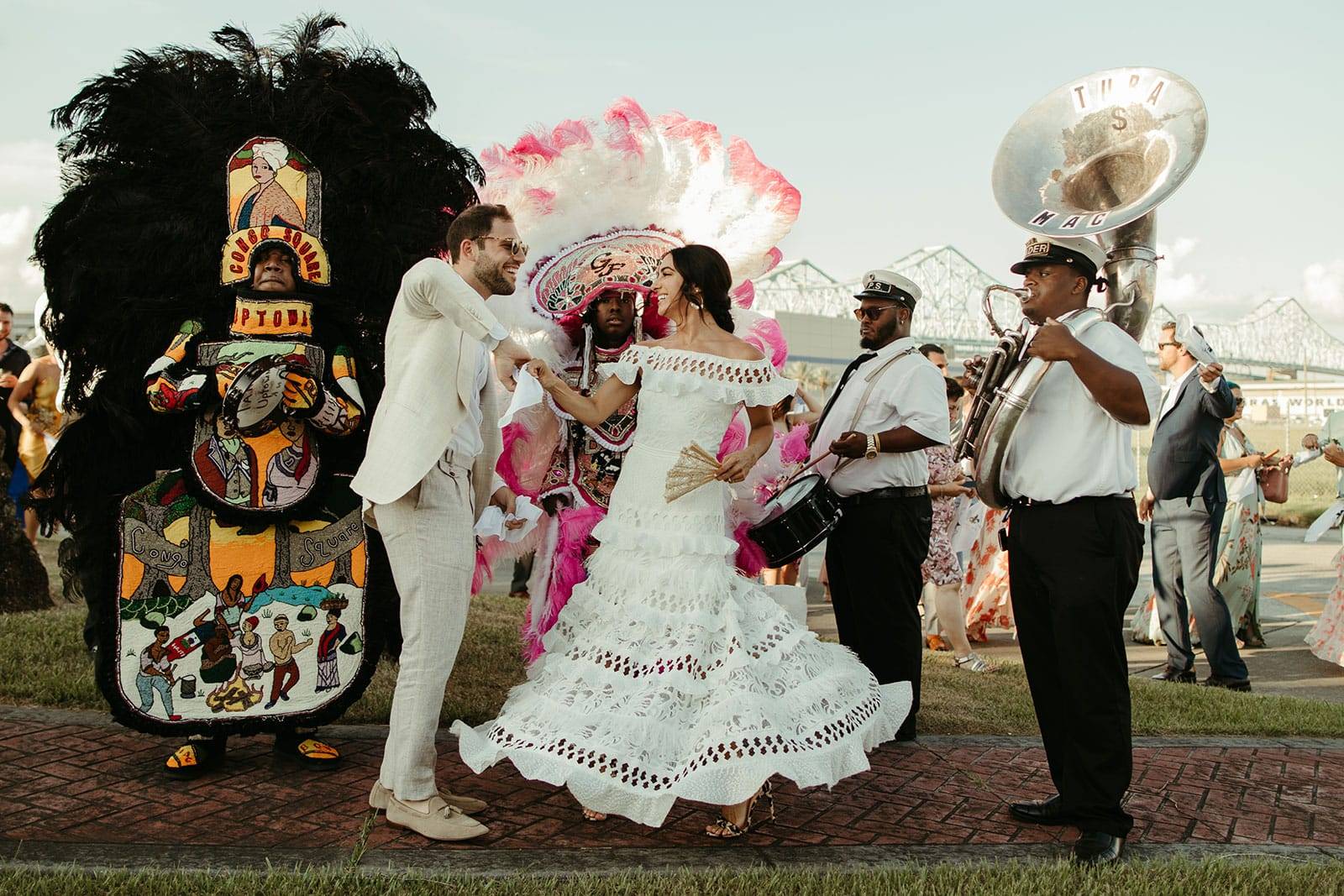 Groom twirling his new wife wearing the Grace Loves Lace coco wedding dress