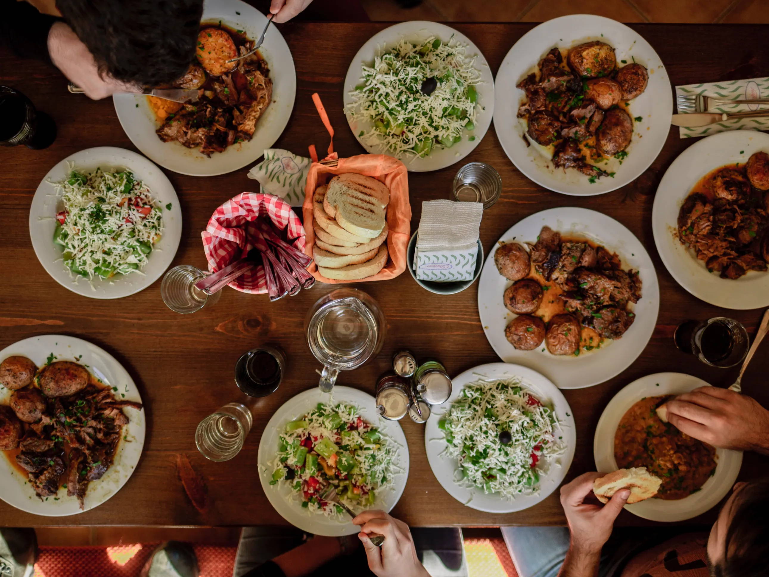 Overhead shot of people eating around a table