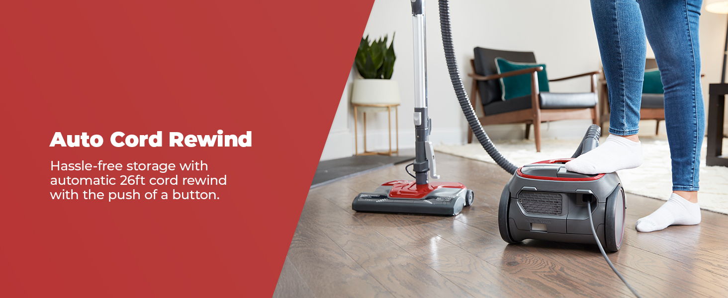 Vacuum cleaner with auto cord rewind feature in a home setting.