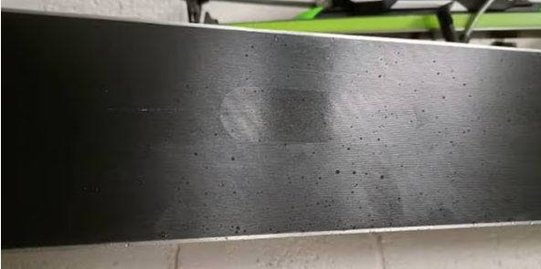 ski core shot repaired with a base welded patch