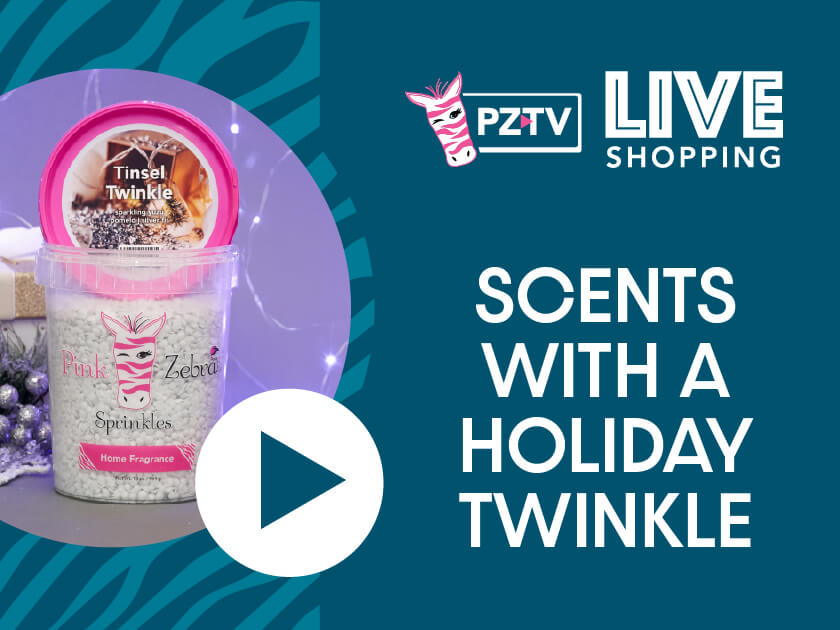 Holiday-themed scented products with a play button for video shopping.