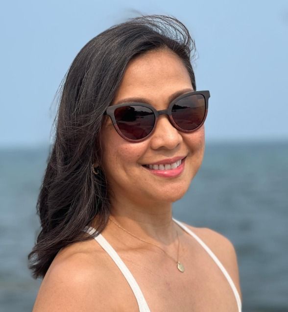 Asian women wearing Ivy sunglasses, wooden cat eye frames for low bridge fit