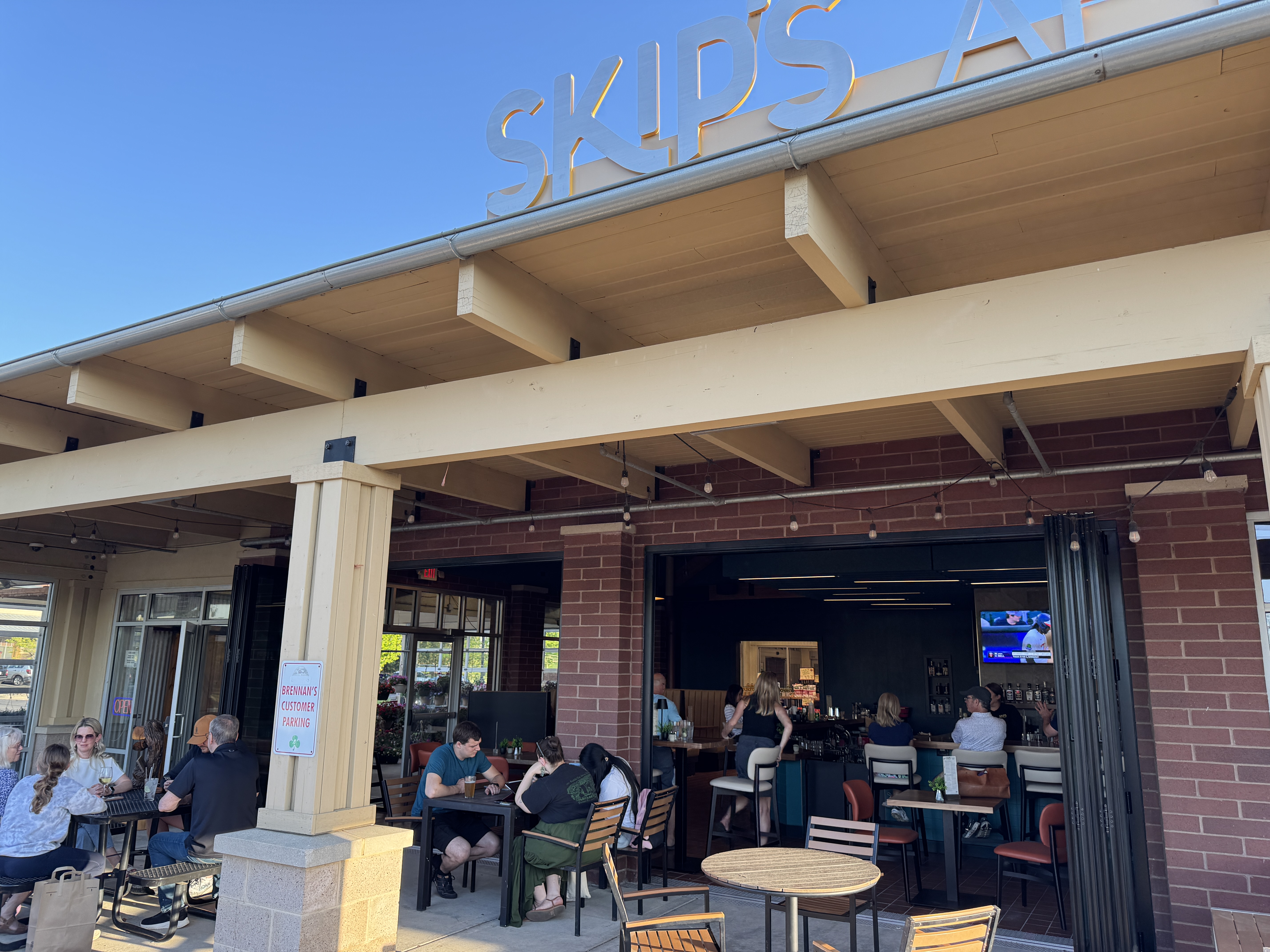 Guests enjoying Skip's After Market Bar and Patio