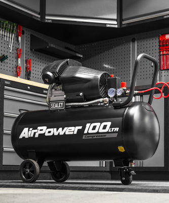 Black air compressor labeled 