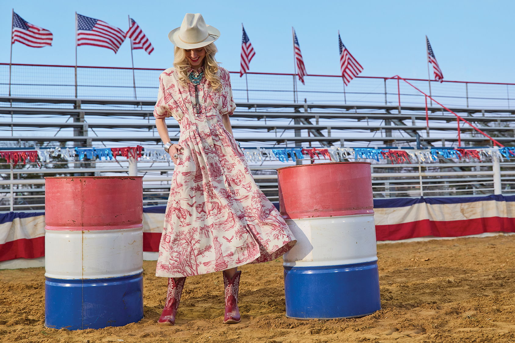 Haley wearing the America The Beautiful Toile Dress with Texas Jack Boots, and Double D Ranch Jewelry and Accessories. 