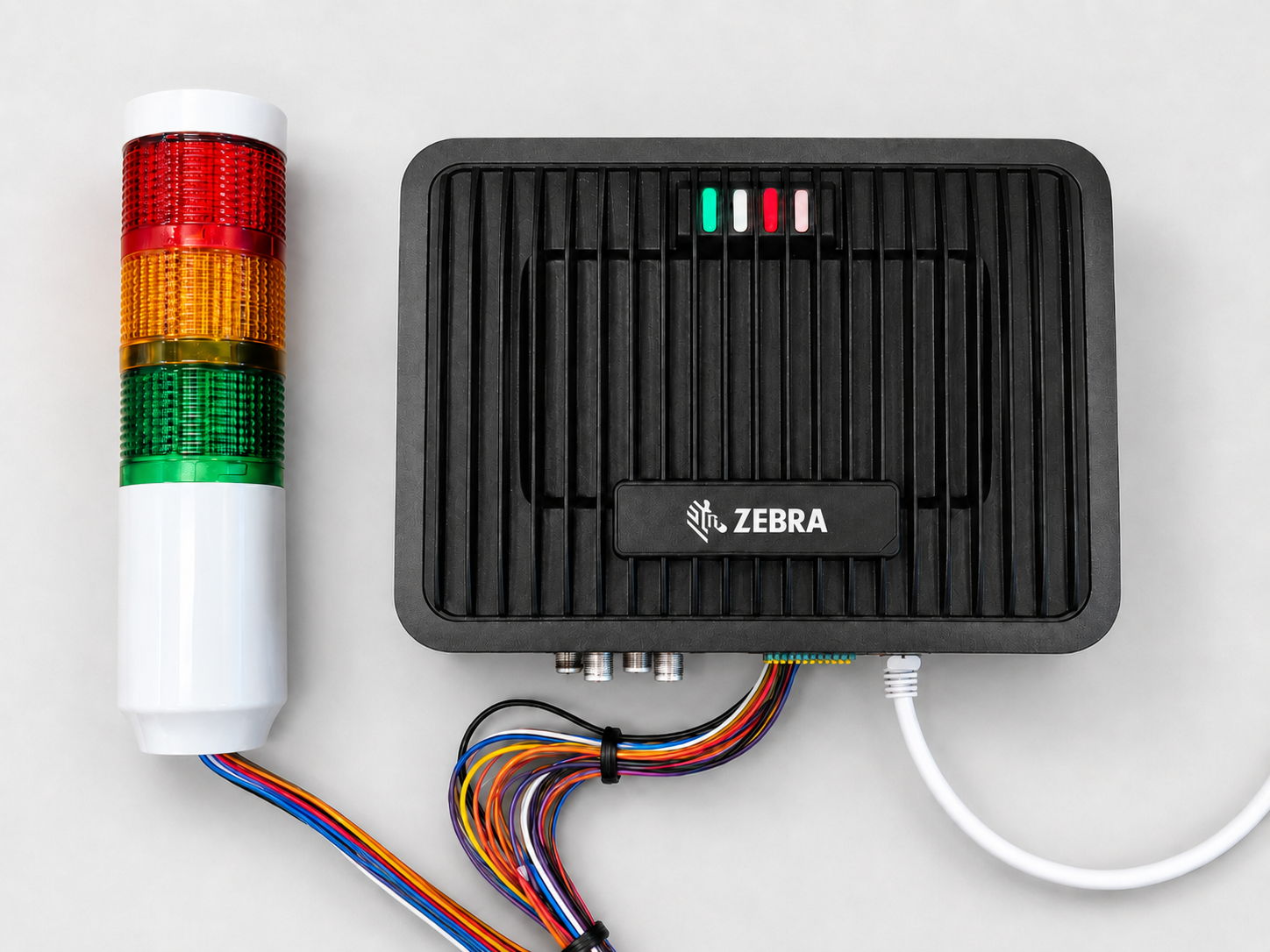 Zebra signal device with control box and colored indicator lights.