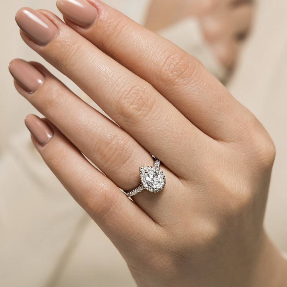 Stunning classy looking diamond halo teardrop engagement ring with 1ct pear cut lab grown diamond in 14k white gold