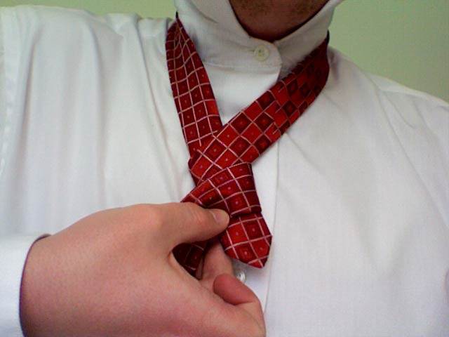 Tie a Four In Hand Knot Step 7