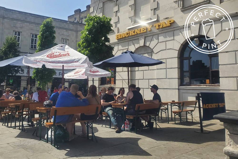 People drinking in the Hackney Tap beer garden