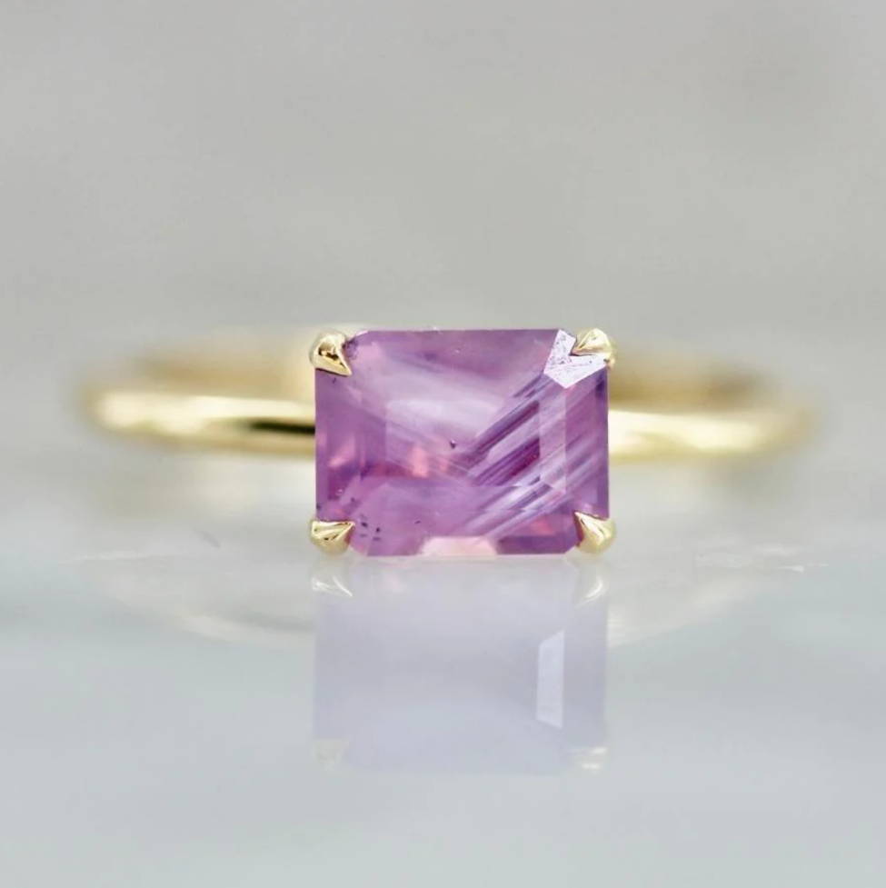 Pink emerald cut opalescent sapphire ring