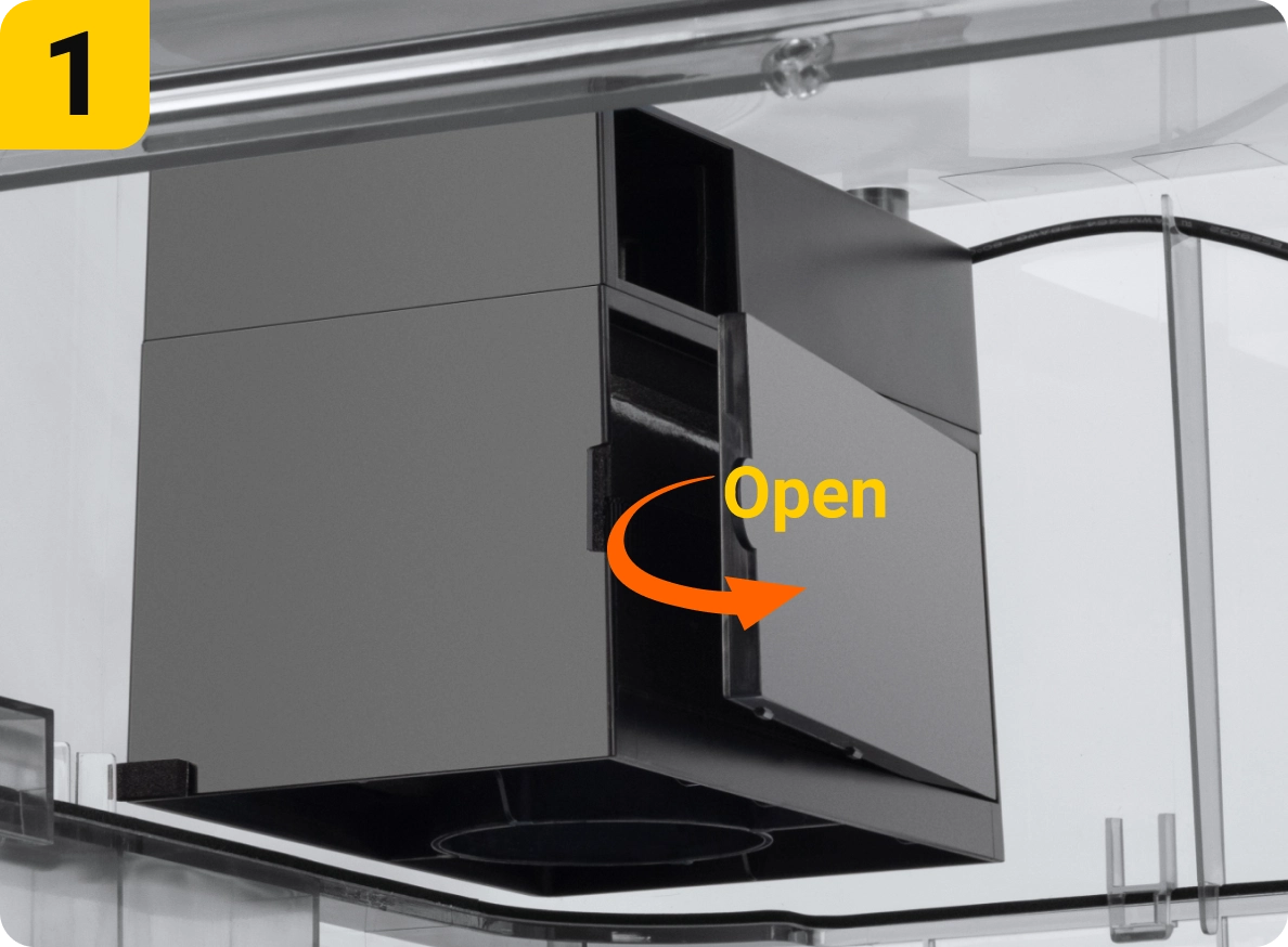 Instruction to open a compartment in a black device.
