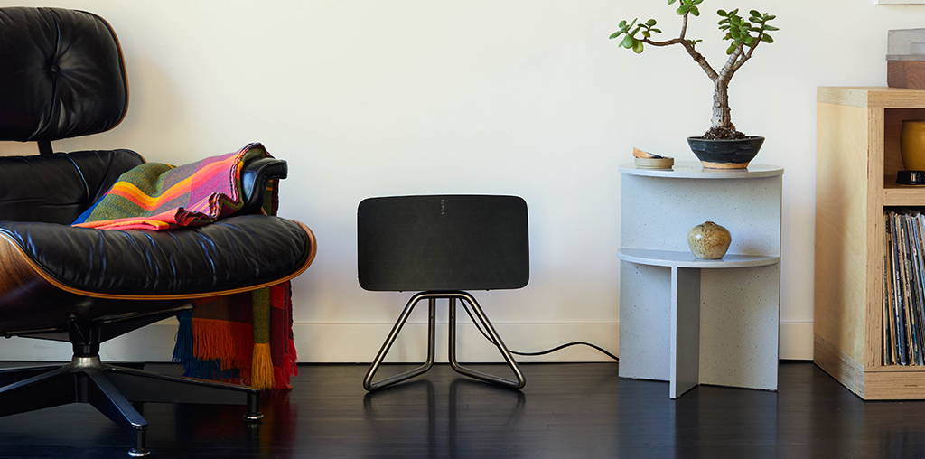 A Sonos Five Speaker sits horizontally on The Sono Five Stand. 