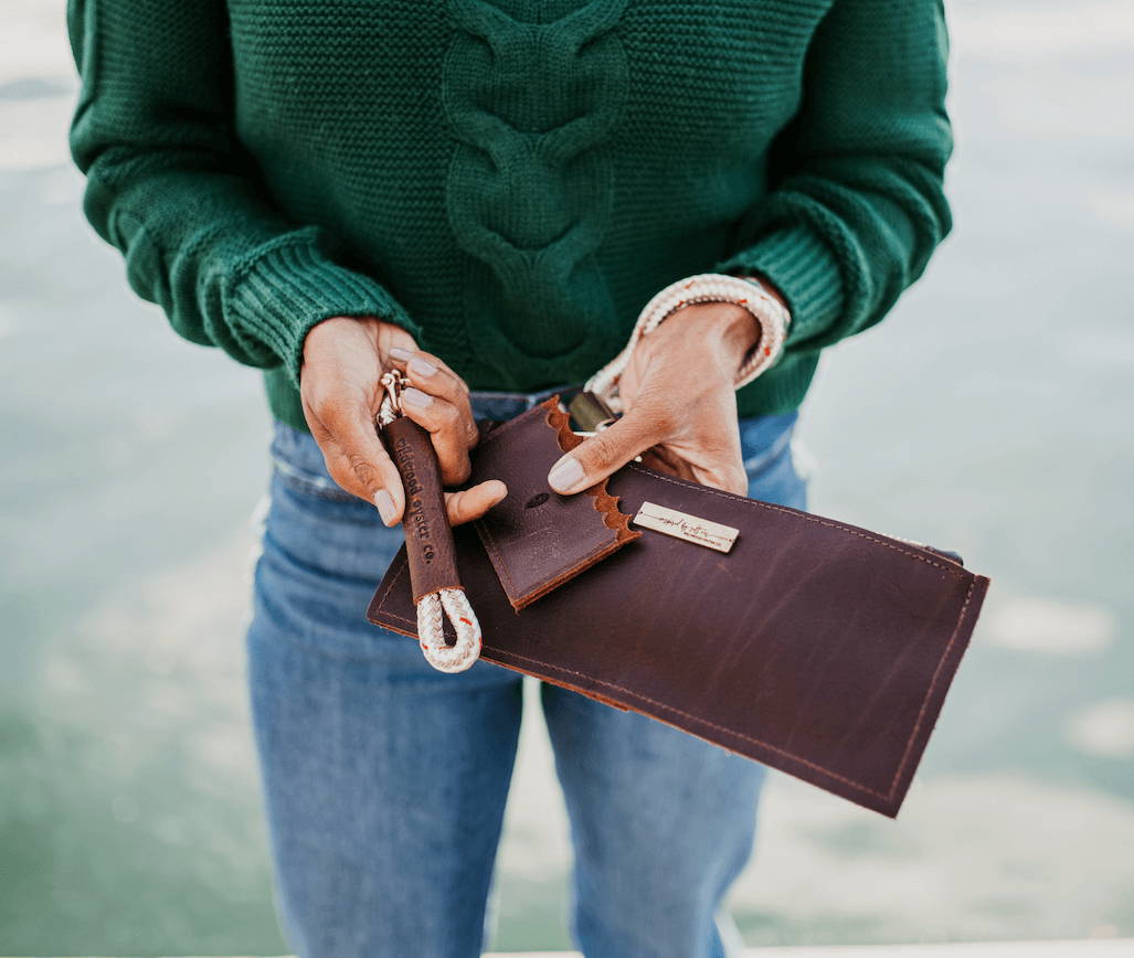 woman holding keychain and coordinating set