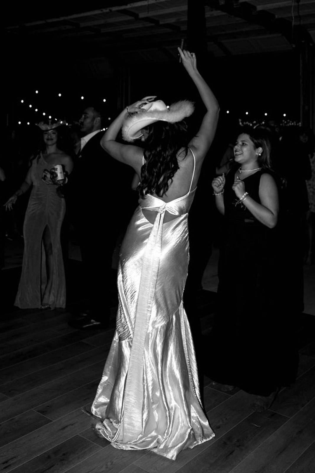 Bride dancing in our Aura gown