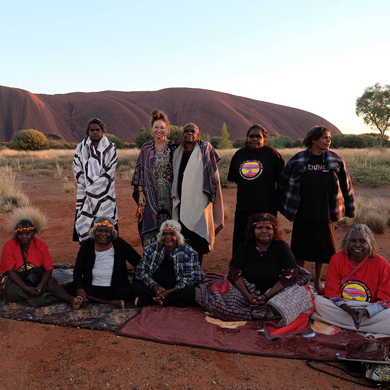 Camilla at Ulura with Indigenous art community 