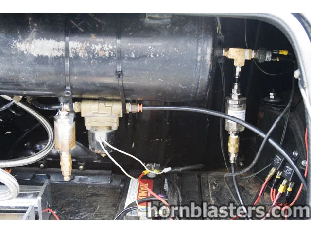 Wide routing view of compressor tank and horn plumbing in Chad's 1970 MINI Cooper build photo 11