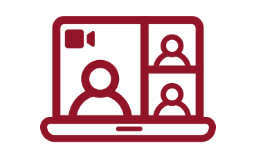 Video call interface with multiple participants displayed on a laptop screen.