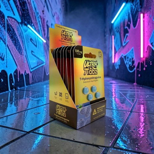 A colorful box of candies in a vibrant, illuminated setting.