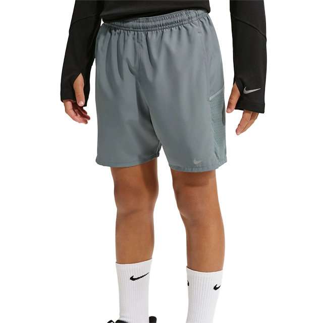 Person wearing gray athletic shorts and black long-sleeve shirt.