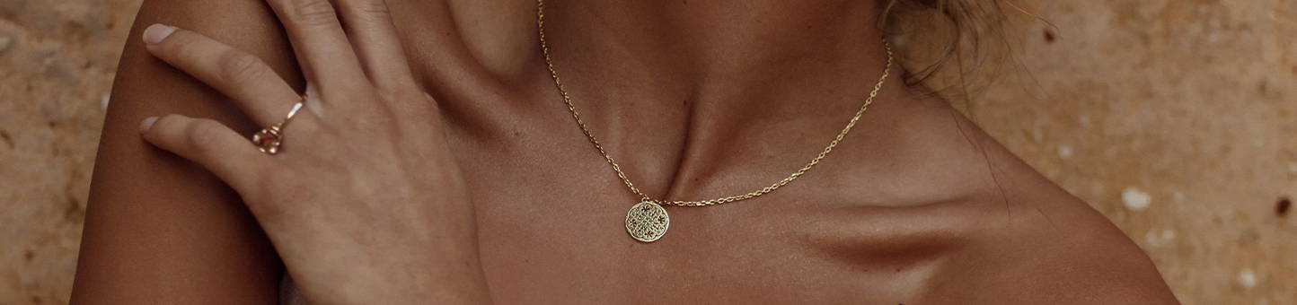 Women wearing the Grace Loves Lace GRACE pendant and gold chain