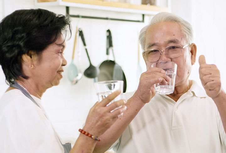Elderly Couple Drinking Water