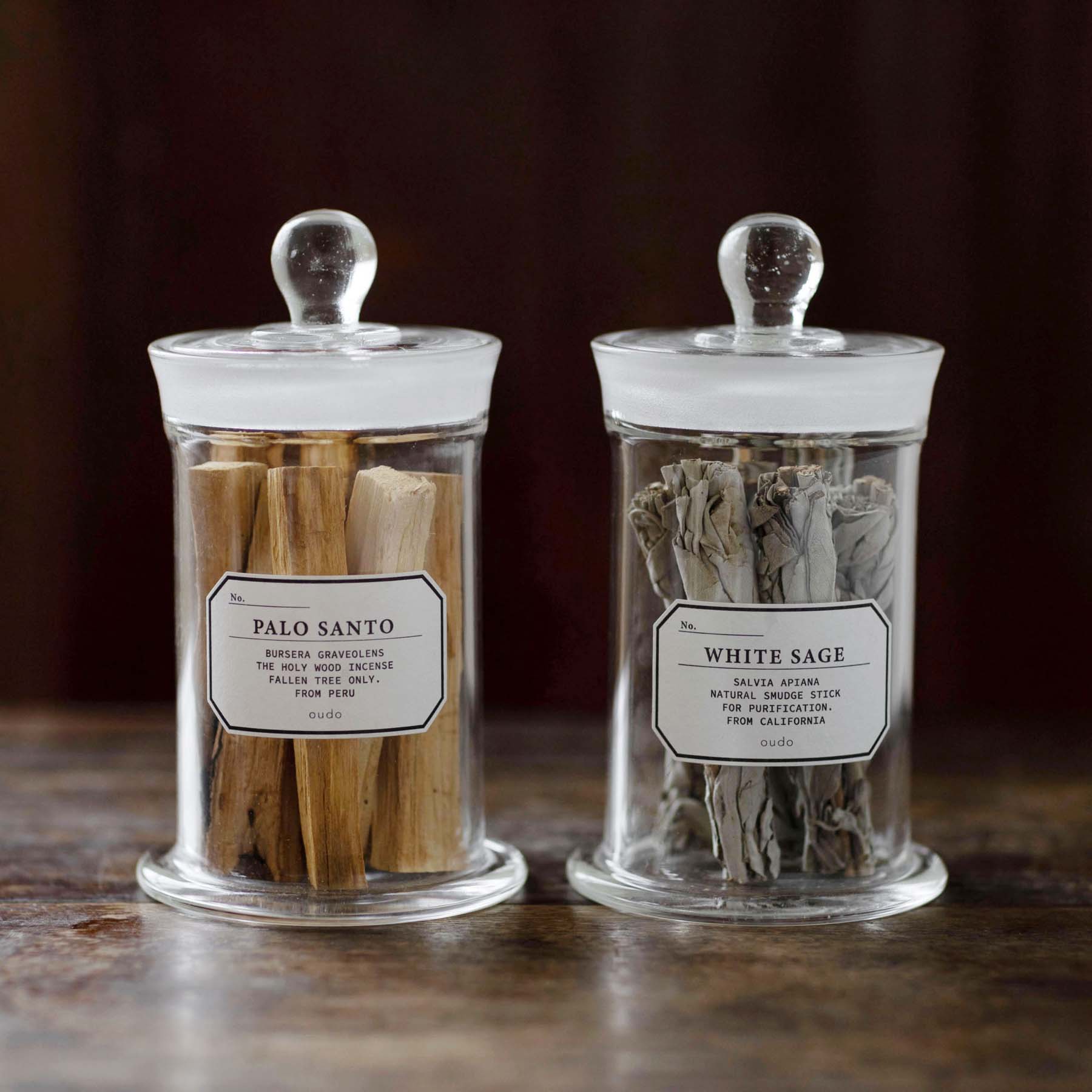 Two glass jars containing pale and white pasta.