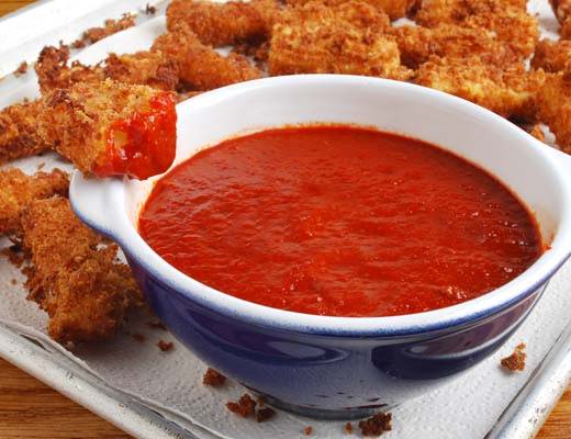 Image of fried cheese with hatch pepper dipping sauce