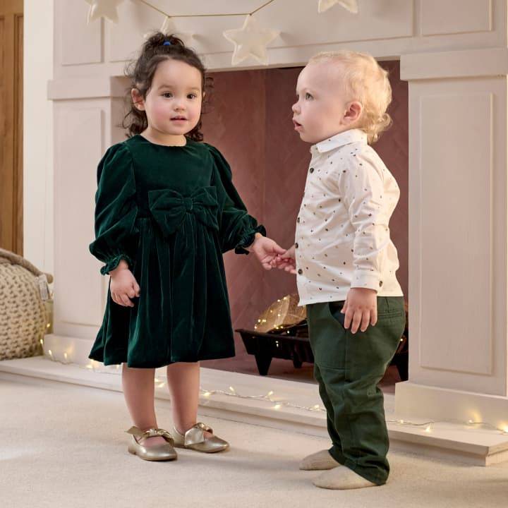 Two little children in occasion wear